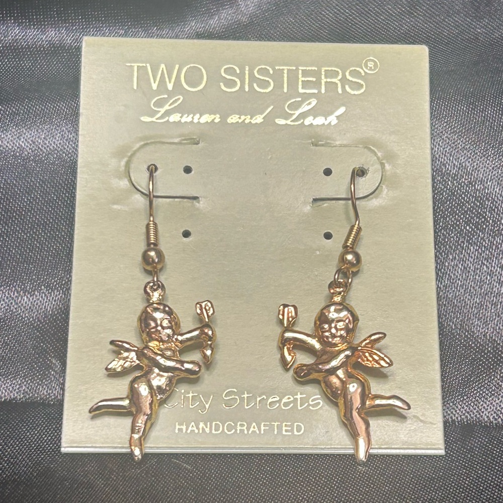 Gold tone Cupid earrings